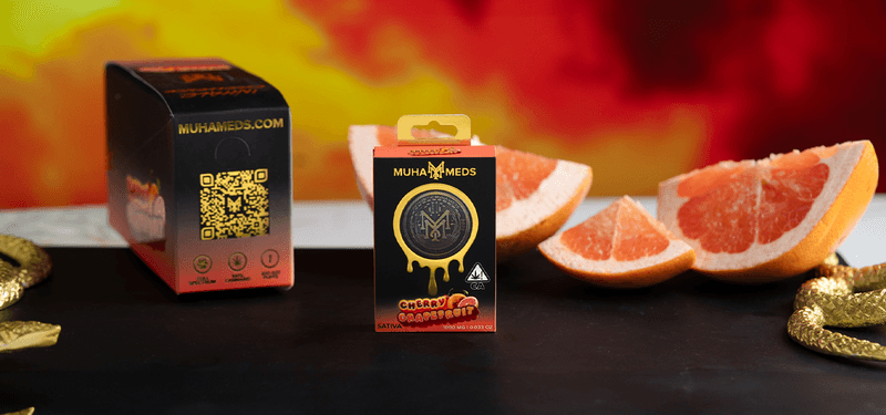 Muha Meds Cherry Grapefruit cart with fresh citrus